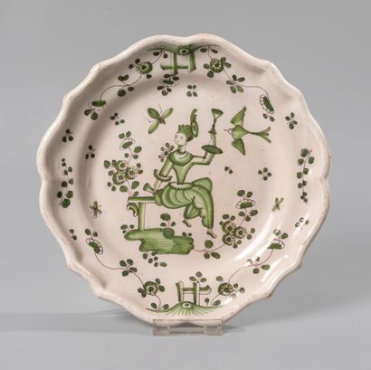 null BORDEAUX, factory of BOYER. Circular earthenware plate with contoured border...