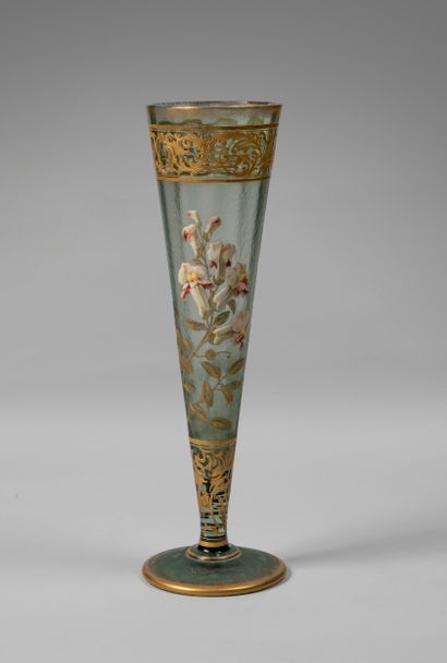 null Vase of flared form on circular pedestal in frosted glass slightly tinted with...