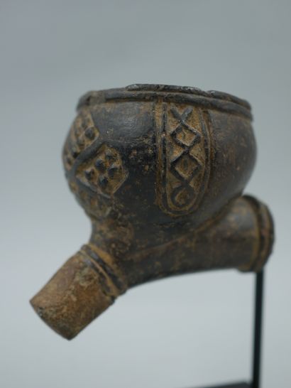 null DEMOCRATIC REPUBLIC OF THE CONGO. Stone pipe carved with the ancient royal sign...