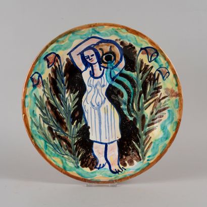 null QUIMPER and Jos LE CORRE. Quimper earthenware plate representing a water carrier....