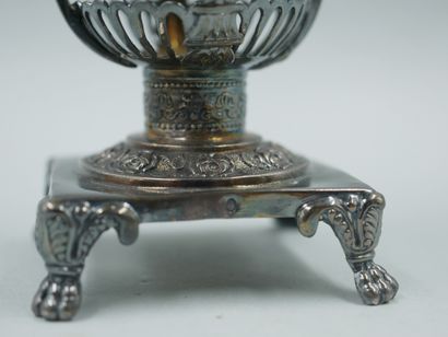 null Silver lot consisting of:

- A mustard pot, the handles with a horse's head,...