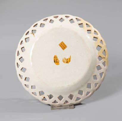 null LUNEVILLE. Circular earthenware bowl with openwork border decorated in low fire...