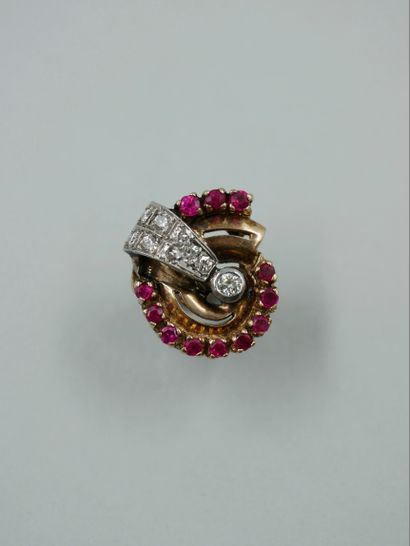 null A 14k yellow and white gold nautilus ring set with old cut diamonds and rubies....