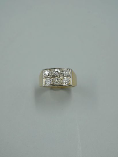 null Band ring in 18k yellow gold and platinum set on two rows of six old cut diamonds...