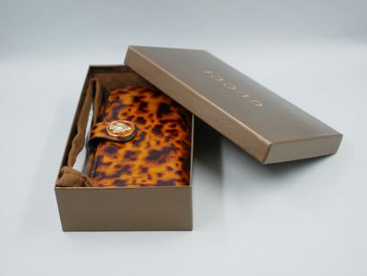 null GUCCI. Wallet "Hysteria" in patent leather with leopard print. Pressure closure...