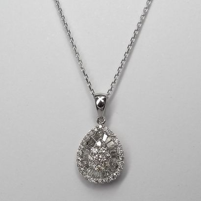 null 18K white gold drop pendant set in its center with a pavement of nine brilliant-cut...