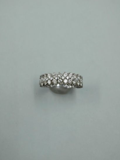 American half wedding ring in 18K white gold...