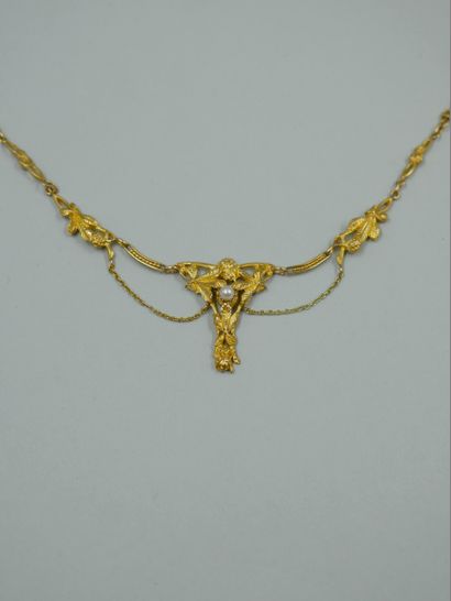 18k yellow gold drapery necklace with a floral...