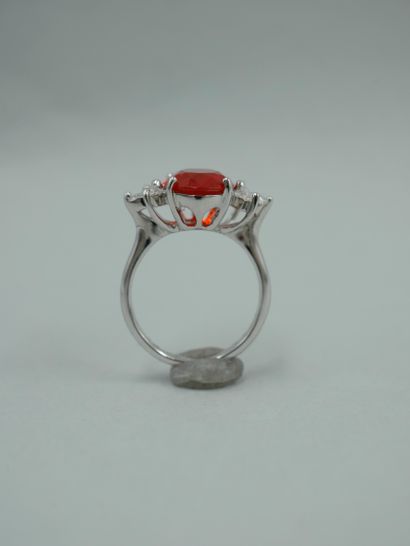 null An 18k white gold ring set with a 2.5ct Mexican fire opal and navette diamonds....