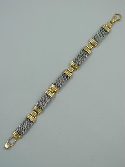 null 
Bracelet en acier et or jaune 14k dans le goût de FRED - Longueur : 18cm -...