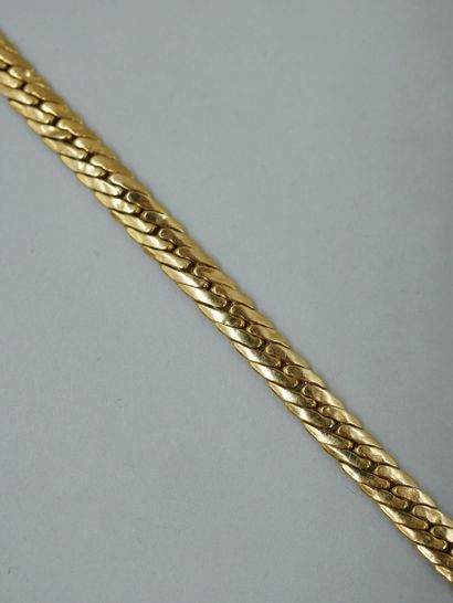 null 18K yellow gold bracelet with English stitch. Weight : 6,70gr - Length : 17...