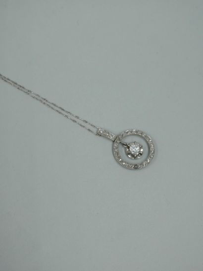 null Platinum and 18k white gold pendant forming a circle set with rose-cut diamonds...