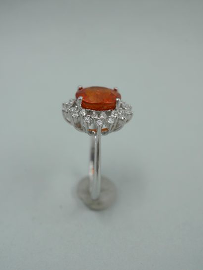 null Pompadour ring in 18K white gold set with a 5cts spessartite garnet in a diamond...