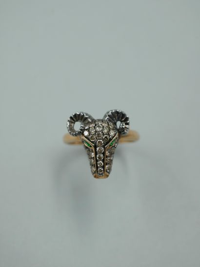 null Ring in 18K two-tone gold with a ram's head paved with diamonds, the eyes set...