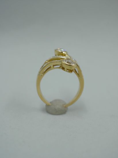 null A Vous Moi ring in 18K yellow gold set with brilliant-cut and baguette diamonds,...