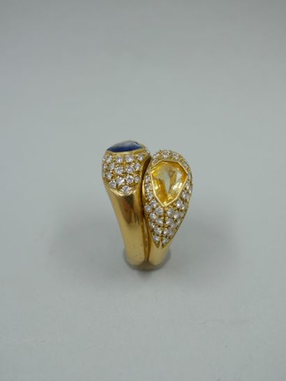 null You and Me" ring in 18k yellow gold set with two sapphires, one yellow and one...