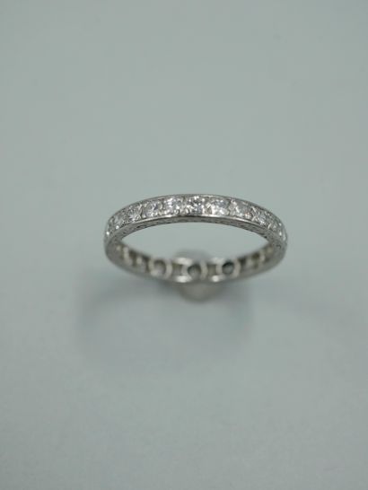 null American wedding ring in platinum set with twenty-five old cut diamonds, the...
