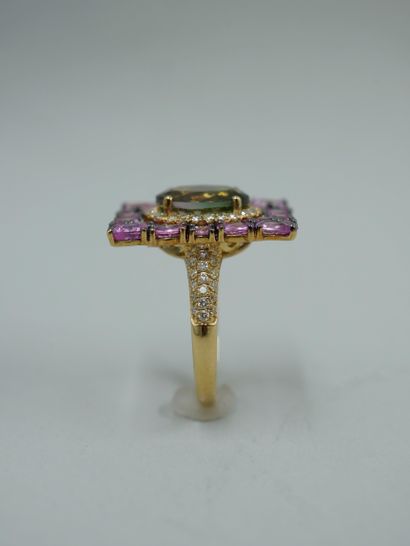 null 18k yellow gold ring set with an oval tourmaline weighing about 3cts set with...