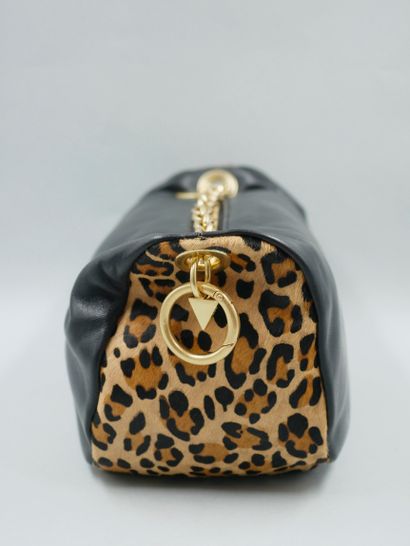null GUESS Luxury. Black leather and leopard skin handbag, chain handle with medallion,...