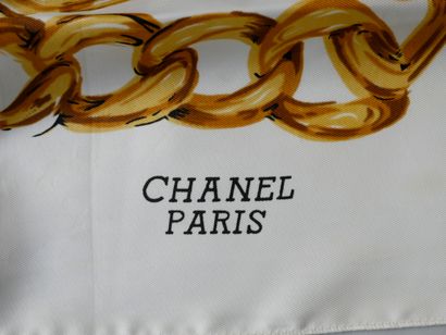 null CHANEL. Silk scarf "Gourmette", white background, button mentioning the historical...