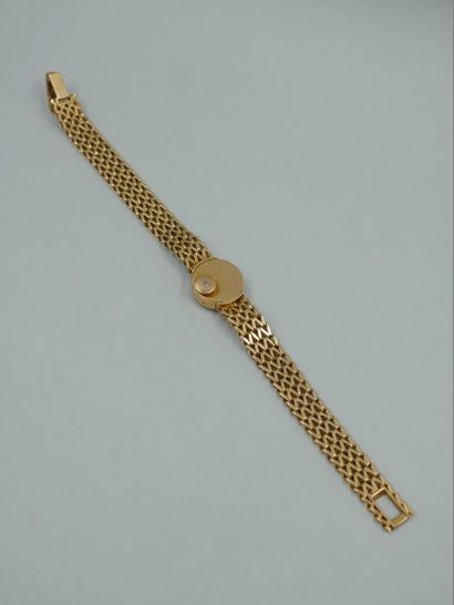 null JAEGER LECOULTRE. Ladies' wristwatch in 18K yellow gold. Round case with baton...