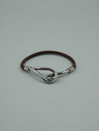 null HERMES Paris. Jumbo" bracelet in natural leather, palladium-plated metal buckle....