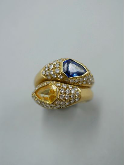 null You and Me" ring in 18k yellow gold set with two sapphires, one yellow and one...