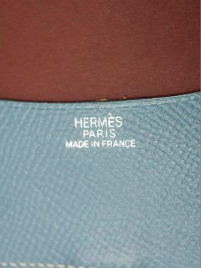 null HERMES Paris. Directory in blue leather with white stitching.