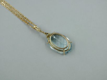 null Pendant set with a topaz of 35cts and a troïda diamond, the clasp set with a...