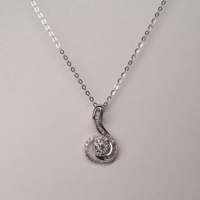 null Pendant in 18K white gold entirely set with brilliant-cut and baguette-cut diamonds...