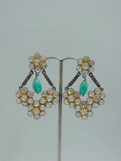 null 
Pair of silver and vermeil candlestick earrings, decorated with flowers set...