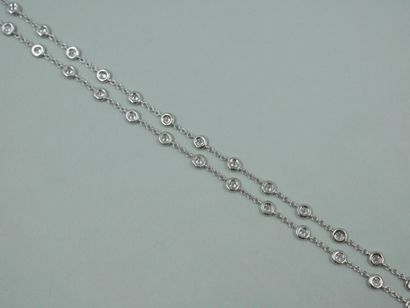 null Necklace in 18K white gold with forçat link punctuated with 37 diamonds in closed...