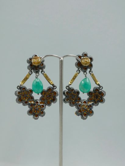 null 
Pair of silver and vermeil candlestick earrings, decorated with flowers set...