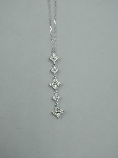 null Pendant in 18K white gold with five four-lobed flowers set with brilliant-cut...