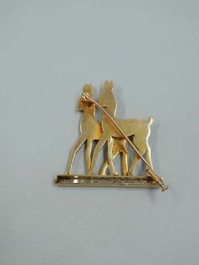 null 18K yellow gold and platinum brooch representing two deer, their eyes set with...