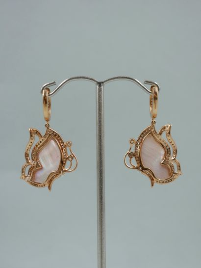 null Pair of earrings in 18K pink gold representing butterflies, the wings set with...