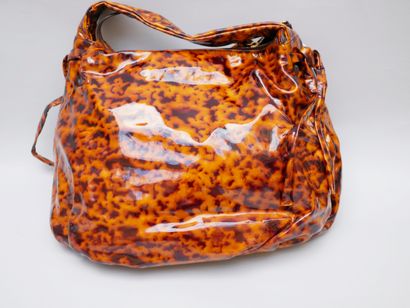 null GUCCI. Hysteria" bag carried on the shoulder in patent leather with a leopard...