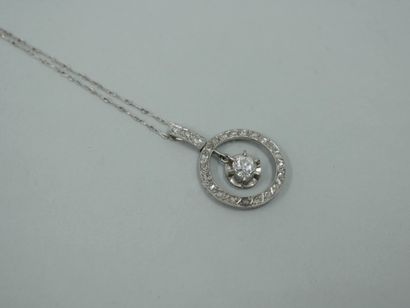 null Platinum and 18k white gold pendant forming a circle set with rose-cut diamonds...