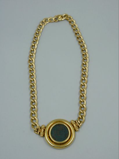 null Necklace in 18k yellow gold with curb chain holding an antique coin as a pendant...