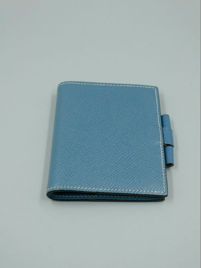 null HERMES Paris. Directory in blue leather with white stitching.