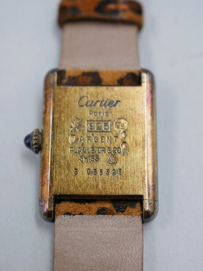 null Must of CARTIER. Women's watch in vermeil, signed dial with radiating guilloché...