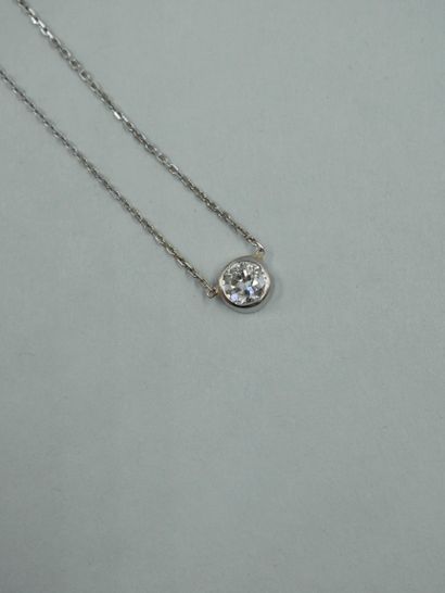 null 18K white gold pendant holding a 0.40ct brilliant cut diamond in a closed setting....
