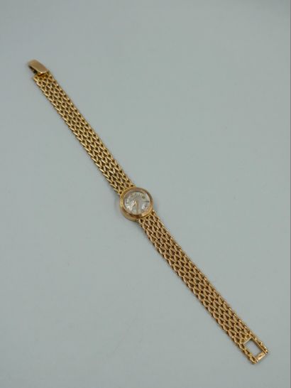 null JAEGER LECOULTRE. Ladies' wristwatch in 18K yellow gold. Round case with baton...
