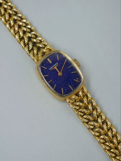 null LONGINES. Ladies' watch with 18K yellow gold case and bracelet, dial with batons...