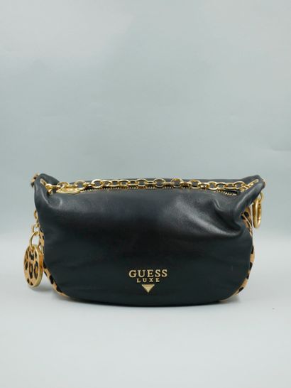 null GUESS Luxury. Black leather and leopard skin handbag, chain handle with medallion,...