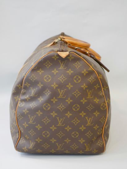 null Louis VUITTON. Keepall" bag in monogrammed canvas and natural leather, double...
