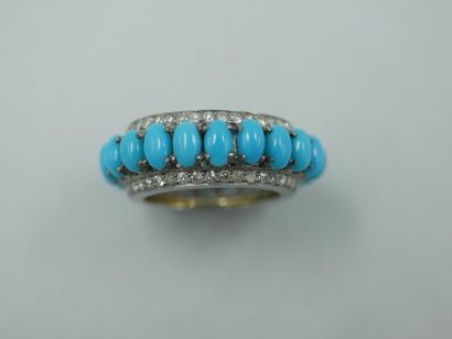 null 
Ring in the ethnic style in silver set with oval turquoise cabochons between...