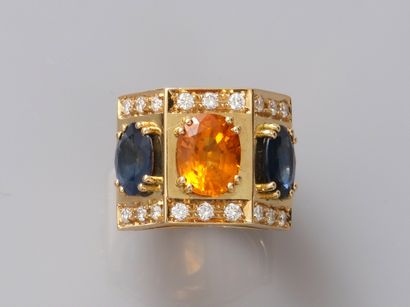 null An important 18k yellow gold Tank style ring set with an oval citrine weighing...