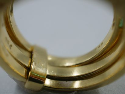 null Bague multiple en or jaune 18k composée de quatre anneaux sertis d'une ligne...