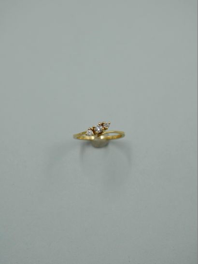 null An 18k yellow gold Vous Moi ring set with three brilliant-cut diamonds. TDD...